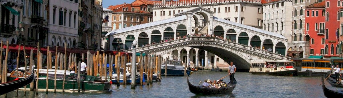 Venice canal bridge and boats